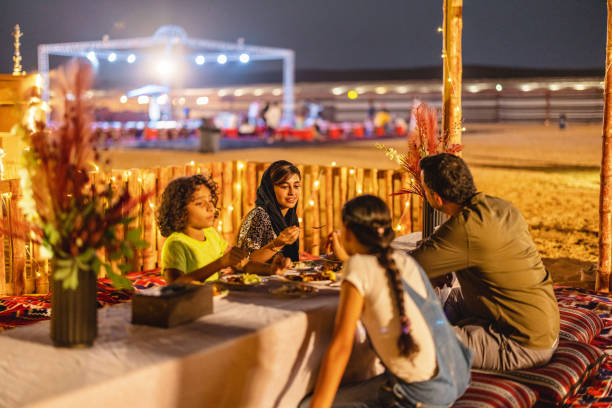 istock Tourists Enjoying Dinner In A Desert Camp In Dubai 1760630714