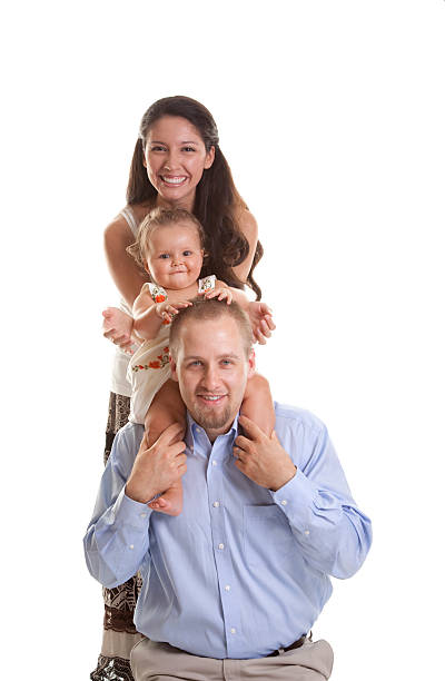 Happy Young Diverse Family with Baby stock photo