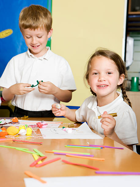 istock primary school: junior children enjoying art 176064788