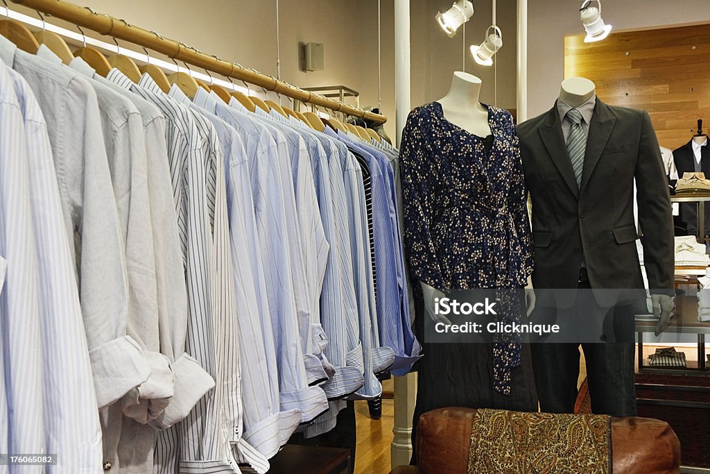 Mannequins in a clothing store A rail of men's shirts in a clothing store with mannequins displaying some of the clothing. Clothing Stock Photo