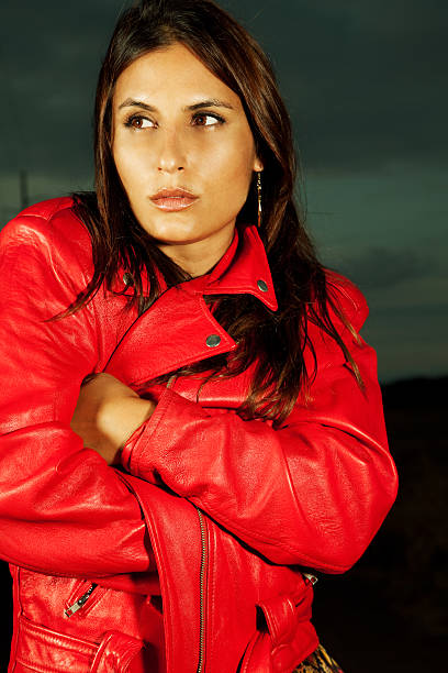 istock Young Woman In Red Leather Jacket 176065281