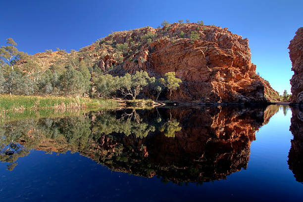 Ellery Creek Bighole Ellery Creek Bighole in the Northern Territory's Macdonnell Ranges National Park. northern territory australia stock pictures, royalty-free photos & images