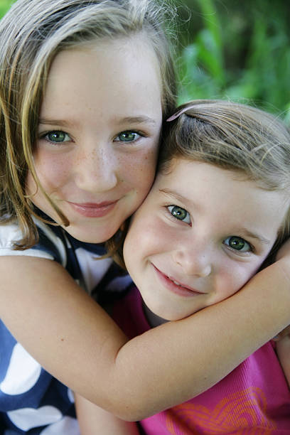 istock Beautiful Little Girls Smiling at Camera 176065789