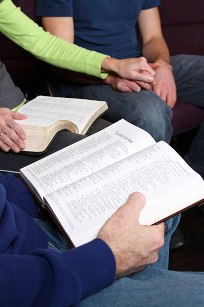 istock Holding hands in Church, Father, Mother, Son 176065865