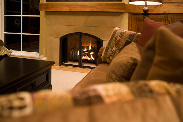 Warm gas fireplace and relaxing living room. stock photo