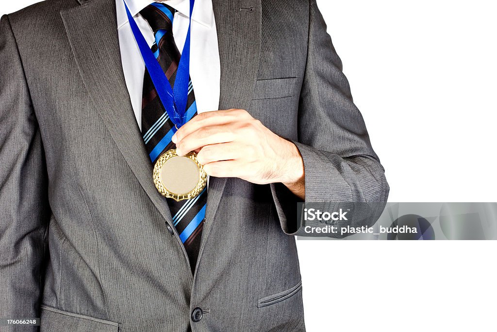 Hombre de negocios con una medalla de oro (xxxl - Foto de stock de Adulto libre de derechos