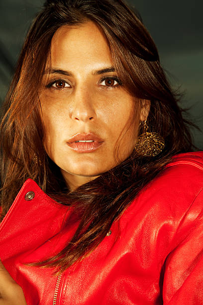 istock Young Woman In Red Leather Jacket 176066286
