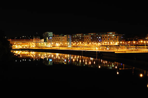 istock Night city scene reflected in water 176066541