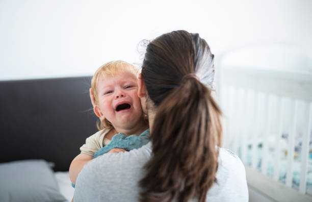 istock Comforting my sick little boy. 1760667310