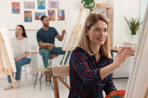 istock Group of students attending painting class in studio. Creative hobby 1760668444
