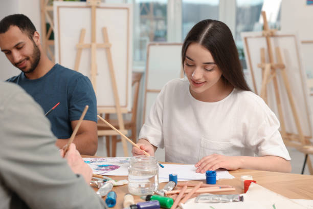 istock Group of students attending painting class in studio. Creative hobby 1760668509