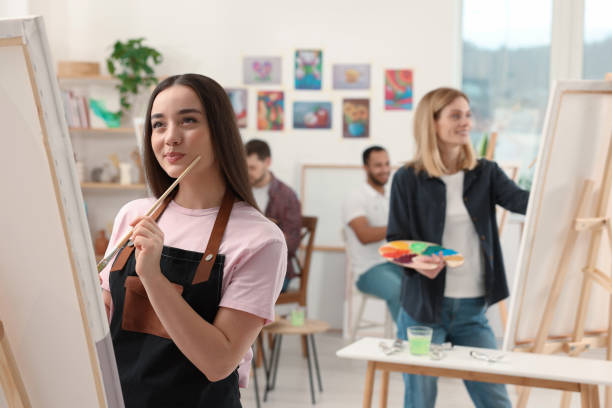 istock Group of students attending painting class in studio. Creative hobby 1760669044
