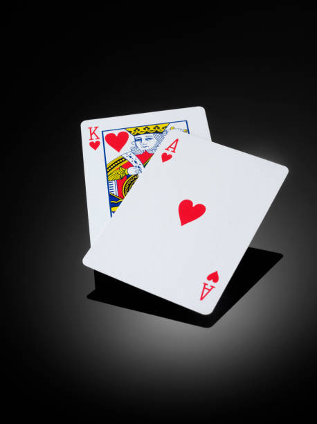 King and Ace of Hearts "Winning hand, in a game of cards.To see more of my card and gambling images, click the link below." hand of cards stock pictures, royalty-free photos & images