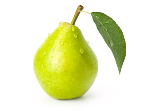 green pear on white