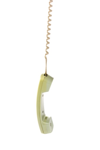 isolated old hanging phone