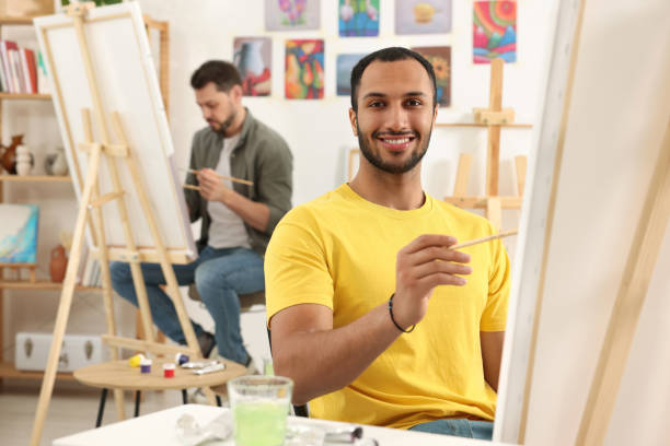istock Group of students attending painting class in studio. Creative hobby 1760672516