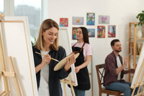 istock Group of students attending painting class in studio. Creative hobby 1760673284