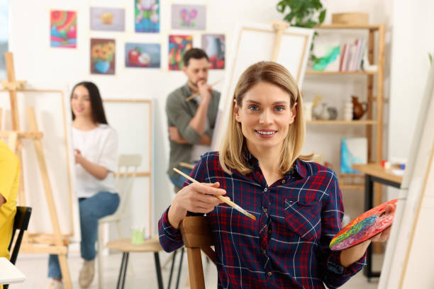 istock Group of students attending painting class in studio. Creative hobby 1760674176