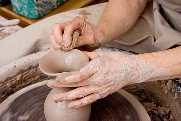 istock Potter Putting On the Finishing Touches 176068926