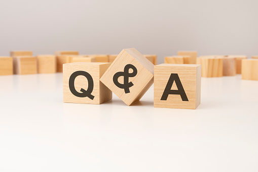 Q and A - Question and Answer, word concept on wooden blocks, text, letters