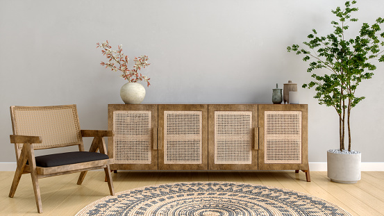 Minimalist living space with natural wood and rattan details.