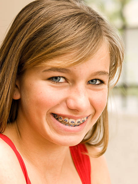 Girl with Braces Smiling stock photo