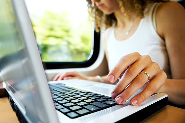 istock young woman and laptop 176070514