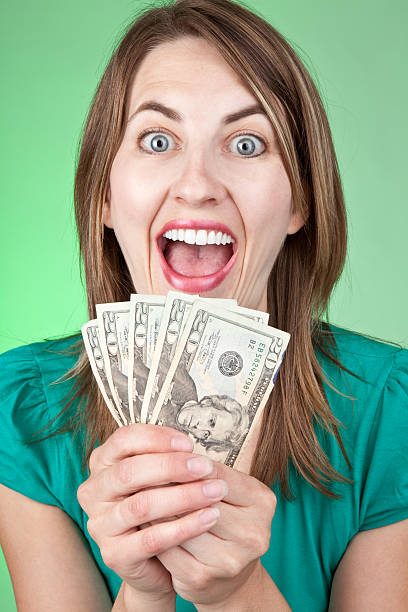 istock Silly Excited Woman With Cash 176070768