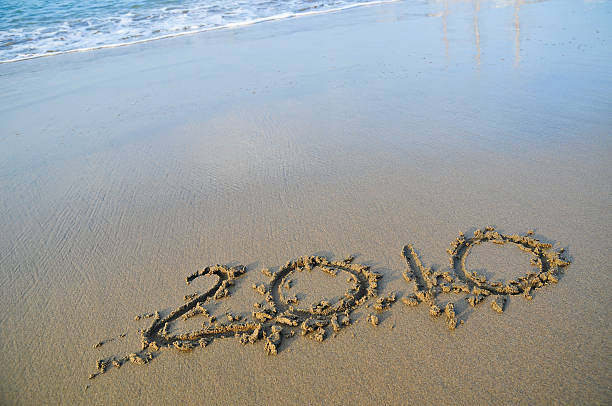 istock New year 2010 on the beach 176070772