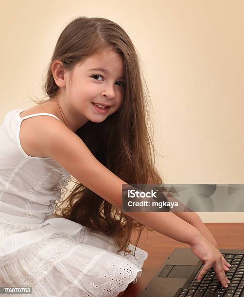Little Girl Using Computer Stock Photo - Download Image Now - 4-5 Years, 6-7 Years, Beautiful People