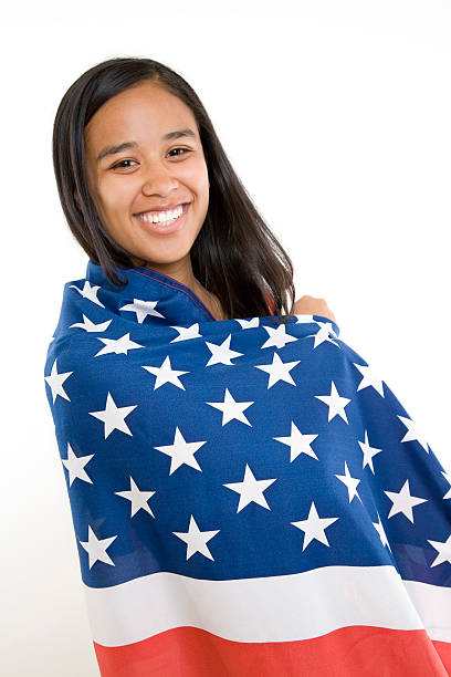 istock Young Girl Wrapped in an American Flag 176071690