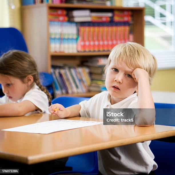 Primary School Deep In Thought Stock Photo - Download Image Now - Child, Classroom, Confusion