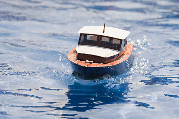 Close-up of a model motorboat outdoors in sunlight (XL)