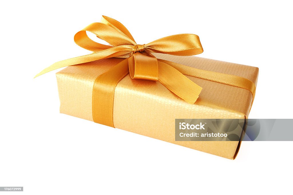 Isolated Golden Gift Box "Golden gift box, isolated on white." Wrapping Paper Stock Photo