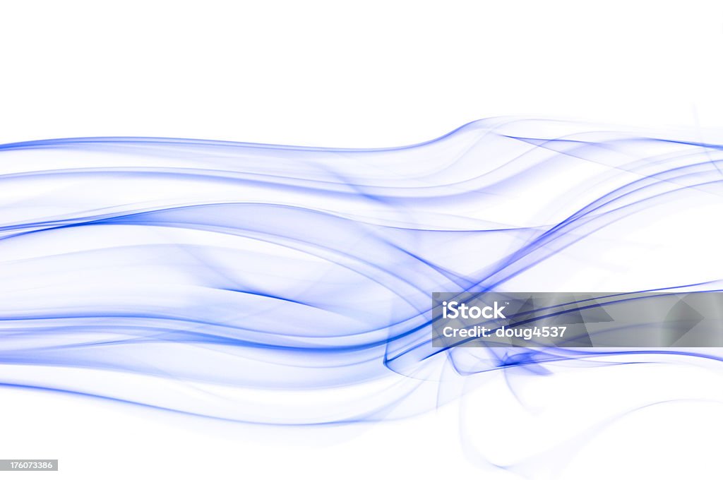 Abstract Smoke Blue smoke against a white background.See more Smoke Backgrounds Abstract Stock Photo