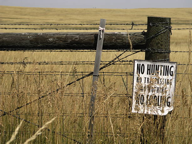 istock No Hunting Sign Plains Prairie 176073391