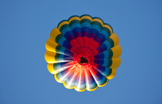 Looking up at the bottom of a hot air balloon.