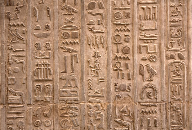 Hieroglyphics on  wall stock photo