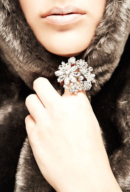 istock Woman Wearing Fur Coat with diamond Brooch 176074317
