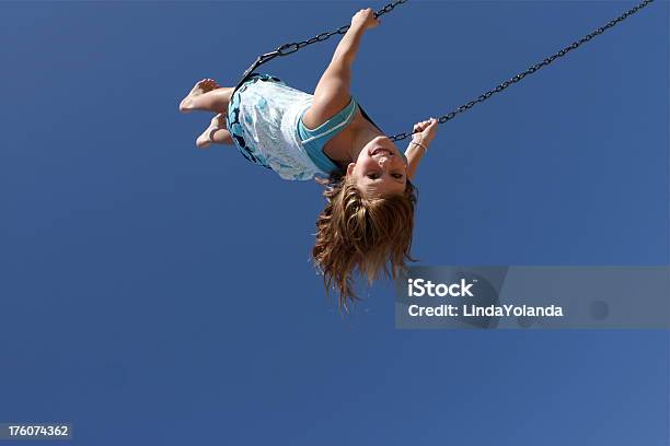 Child On Swing Stock Photo - Download Image Now - Child, Swing - Play Equipment, Using A Swing