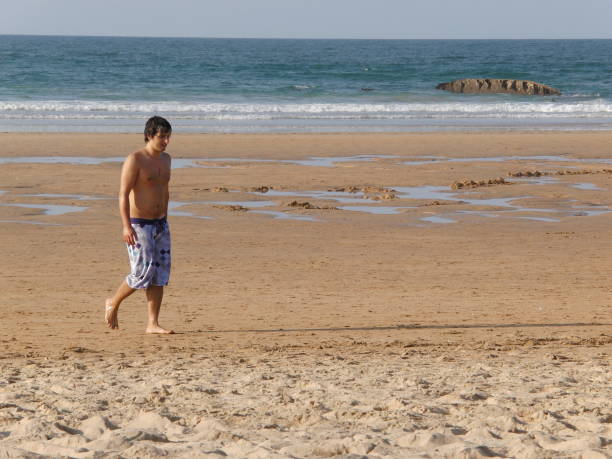 istock Young man in the beach in summer, Cantabria 1760745011