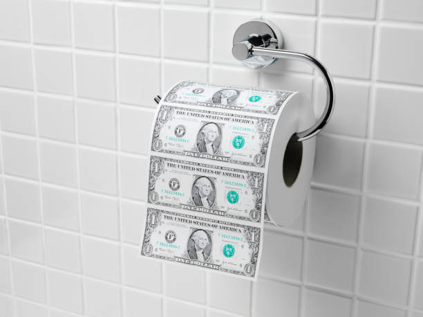Dollars used as toilet paper indicate the depreciation of the currency. / You can see the animation movie of this image from my iStock video portfolio. Video number: 1481227943