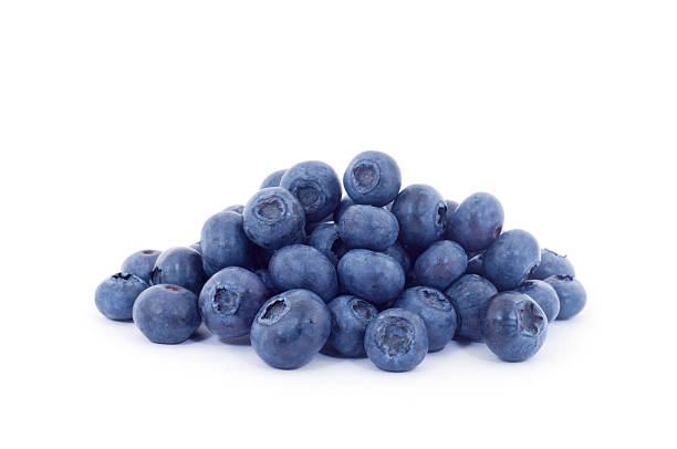 Large Pile of Blueberries Isolated on White stock photo
