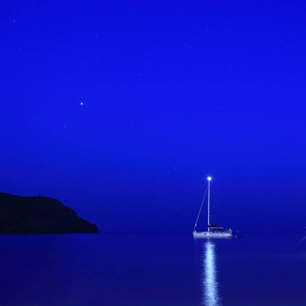 istock Blue Tranquility, Boat and twilight on sea 176075495