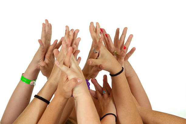 istock Six people's Hands raised holding joining togetherness volunteer voting 176076019