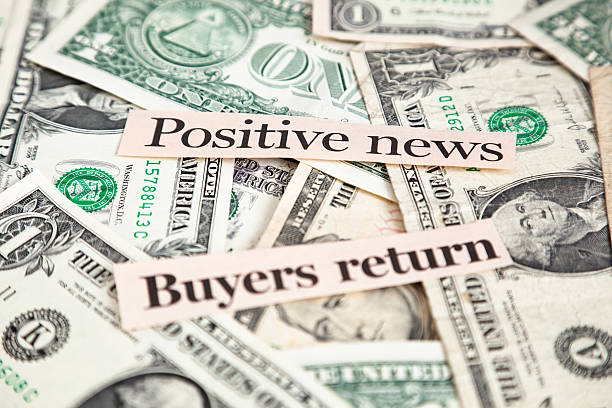 istock Positive financial newspaper headlines on dollar bills. Crises is over. 176076483