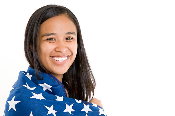 istock Cute Young Hispanic Girl Wrapped in USA Flag, With Copyspace 176077829