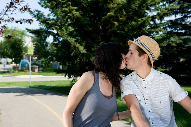 istock Couple Kissing In Park 176078243