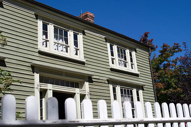 istock House Behind Picket Fence 176078344