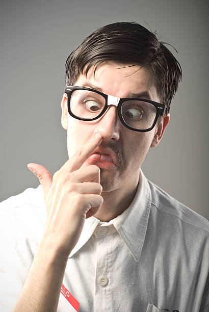 Detect Nerd 10+ Smart Nerd Picking Nose Stock Photos, Pictures & Royalty-Free ...